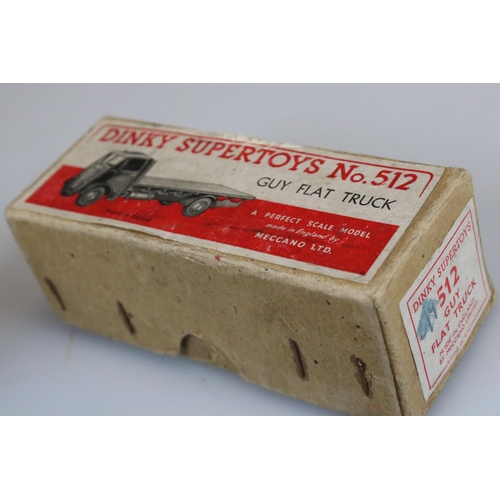 576 - Boxed play worn Dinky Supertoys No 512 Guy Flat Truck diecast model in maroon, a boxed Matchbox 64 C... 