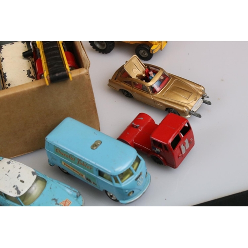 516 - Around 40 mid 20th C play worn diecast models to include Corgi and Dinky featuring Corgi Toblerone V... 