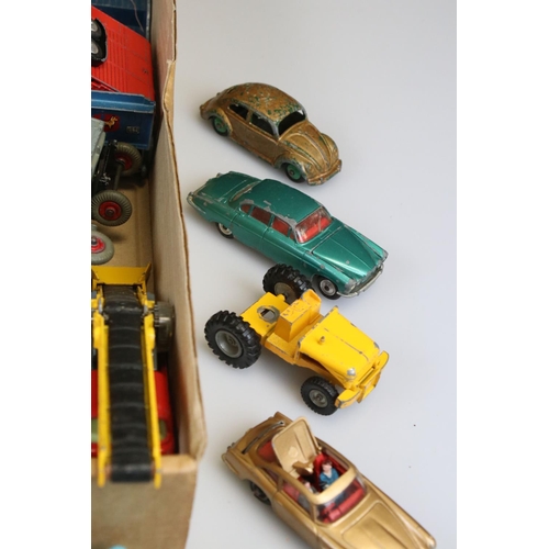 516 - Around 40 mid 20th C play worn diecast models to include Corgi and Dinky featuring Corgi Toblerone V... 