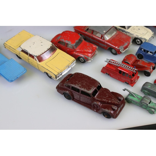 519 - Around 45 mid 20th C play worn diecast models to include mainly Dinky of various scale, features ear... 