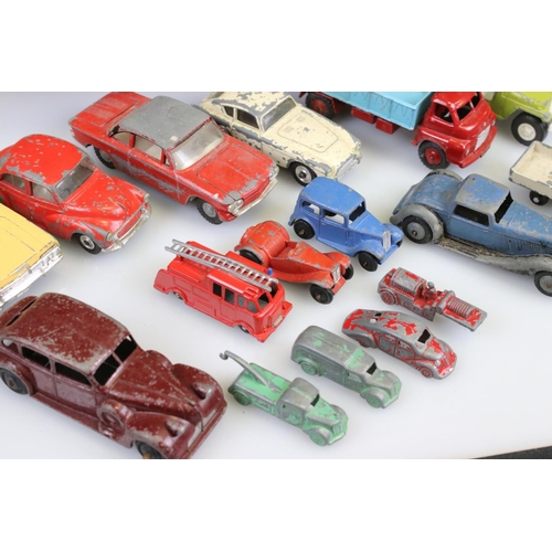 519 - Around 45 mid 20th C play worn diecast models to include mainly Dinky of various scale, features ear... 