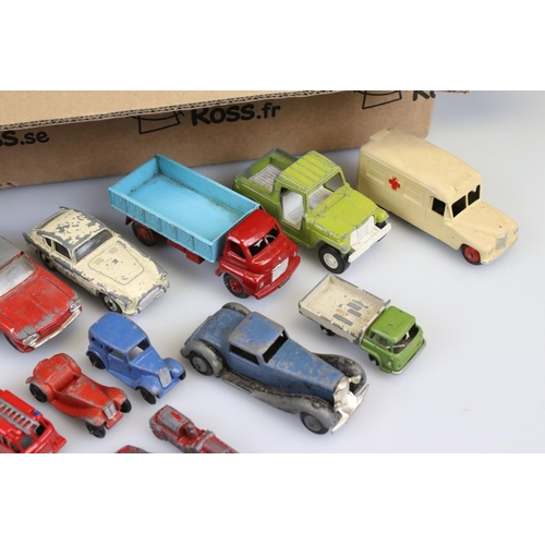 519 - Around 45 mid 20th C play worn diecast models to include mainly Dinky of various scale, features ear... 