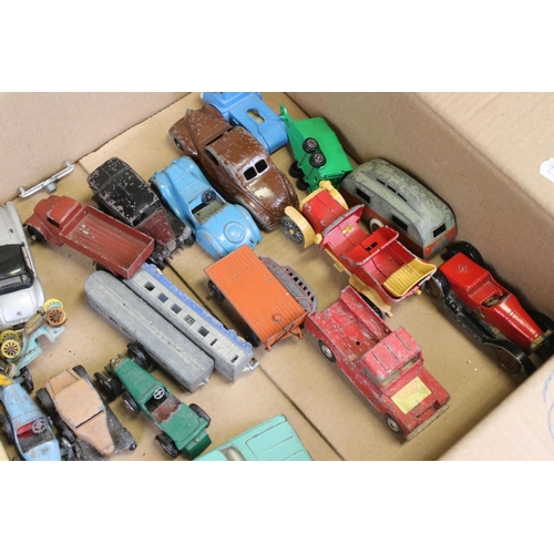 519 - Around 45 mid 20th C play worn diecast models to include mainly Dinky of various scale, features ear... 