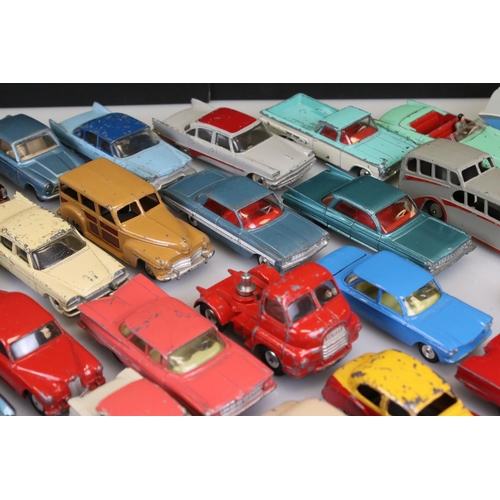 525 - Collection of around 60 mid 20th C play worn diecast models to include Corgi and Dinky, to include C... 