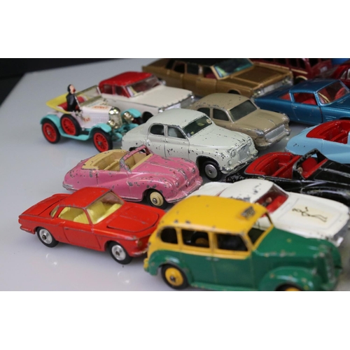 525 - Collection of around 60 mid 20th C play worn diecast models to include Corgi and Dinky, to include C... 