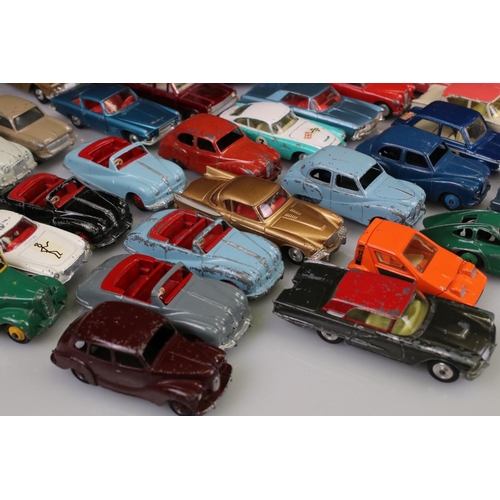 525 - Collection of around 60 mid 20th C play worn diecast models to include Corgi and Dinky, to include C... 