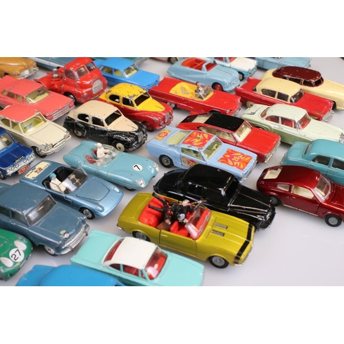 525 - Collection of around 60 mid 20th C play worn diecast models to include Corgi and Dinky, to include C... 