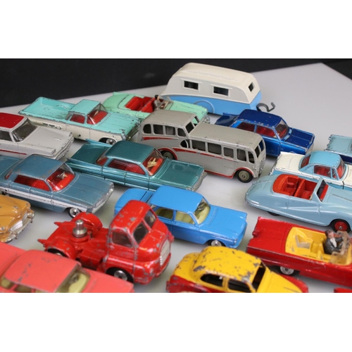 525 - Collection of around 60 mid 20th C play worn diecast models to include Corgi and Dinky, to include C... 