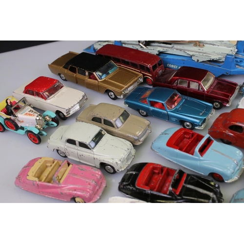 525 - Collection of around 60 mid 20th C play worn diecast models to include Corgi and Dinky, to include C... 