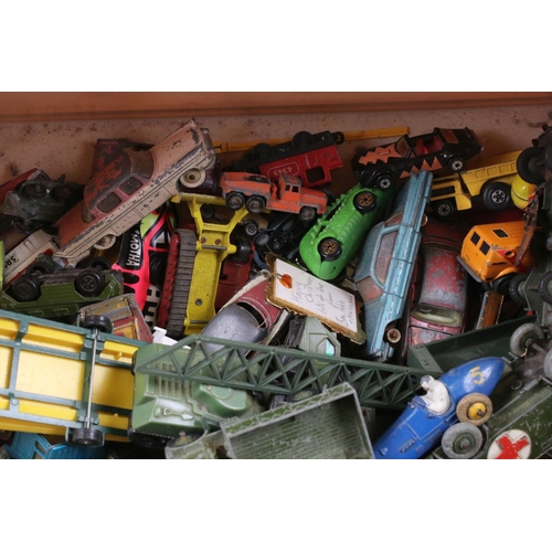 551 - Large quantity of heavily play worn mid 20th C diecast models to include Corgi & Dinky featuring com... 