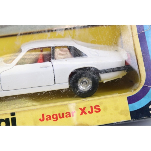 554 - Boxed Corgi 320 Jaguar XJS The Saint diecast model, diecast vg with minimal marks, box tatty