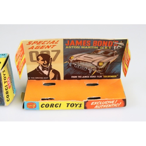 560 - Boxed Corgi 261 James Bond Aston Martin DB5 diecast model with ejector figure, some paint chips but ... 