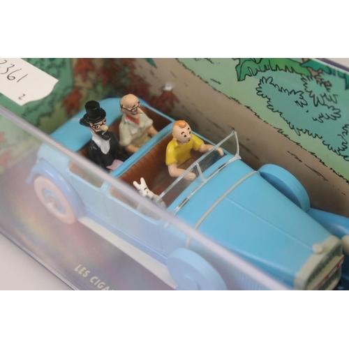 561 - Two cased Herge Moulinsart Tin Tin diecast models to include Les Cigares Du Pharaon and TinTin et Le... 