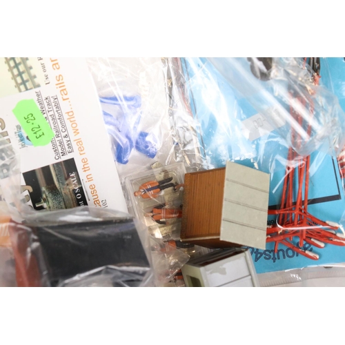 105 - Quantity of model railway items and lay out build accessories, some bagged and unopened, contained w... 