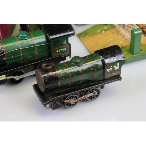 119 - Group of Hornby O gauge model railway to include 2 x 0-4-0 locomotives in green livery, one with ten... 