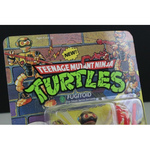 146 - Teenage Mutant Ninja Turtles - Carded Playmates TMNT Fugitoid figure, unpunched, some bottom corner ... 