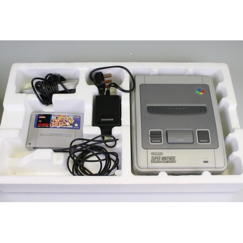 174 - Retro Gaming - Boxed Super Nintendo SNES console, Street Fighter II Turbo version with game cartridg... 