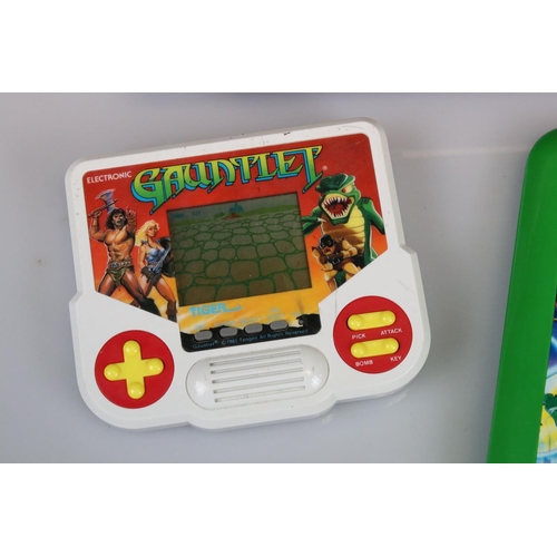 181 - Retro Gaming - Five handheld games to include Konami Teenage Mutant Ninja Turtles, Tiger Paperboy, E... 