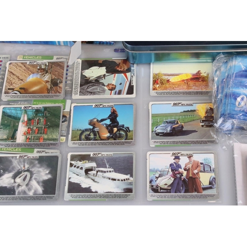 237 - Collection of James Bond 007 Spy Cards to include around 100 cards, 28 x Magazines, 2 x Card Tins, 1... 