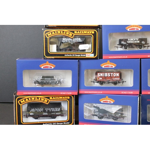 73 - Nine boxed OO gauge items of rolling stock to include 6 x Bachmann and 3 x Palitoy Mainline to inclu... 