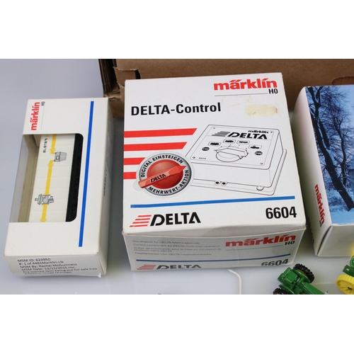 75 - Quantity of Marklin HO gauge model railway to include an unboxed starter set with locomotive, rollin... 