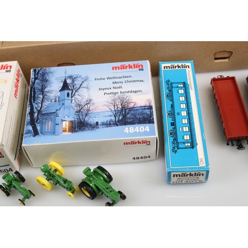 75 - Quantity of Marklin HO gauge model railway to include an unboxed starter set with locomotive, rollin... 