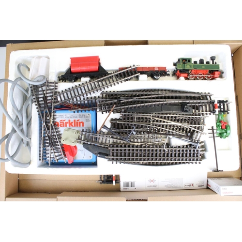 75 - Quantity of Marklin HO gauge model railway to include an unboxed starter set with locomotive, rollin... 