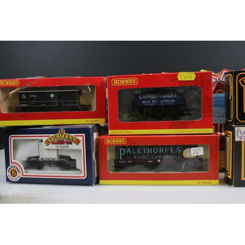 78 - 28 Boxed OO gauge items of rolling stock to include wagons and vans featuring 6 x Hornby, 7 x Mainli... 