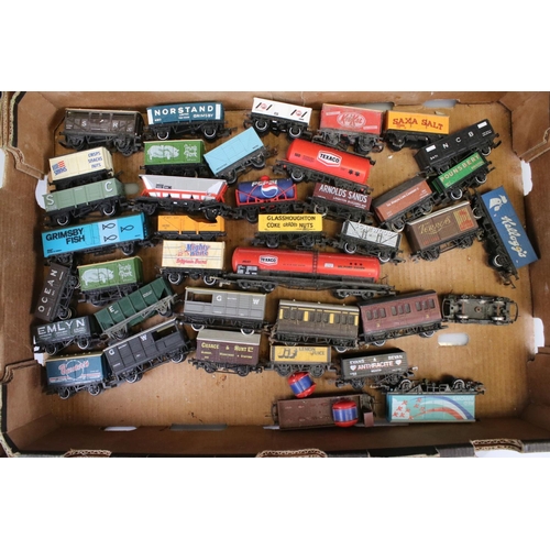 82 - Approximately 45 OO gauge items of rolling stock featuring carriages and wagons including Hornby, Wr... 