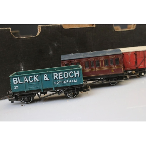 82 - Approximately 45 OO gauge items of rolling stock featuring carriages and wagons including Hornby, Wr... 