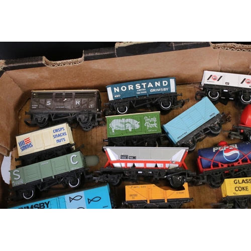 82 - Approximately 45 OO gauge items of rolling stock featuring carriages and wagons including Hornby, Wr... 