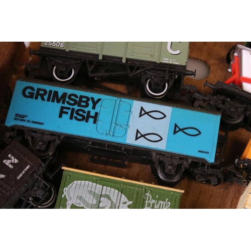 82 - Approximately 45 OO gauge items of rolling stock featuring carriages and wagons including Hornby, Wr... 