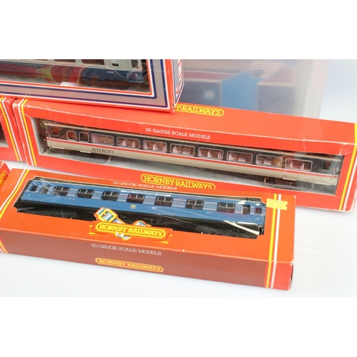 87 - 13 Boxed OO gauge items of rolling stock to include 5 x Hornby and 8 x Lima examples, all coaches