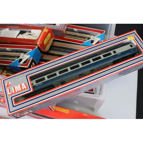 87 - 13 Boxed OO gauge items of rolling stock to include 5 x Hornby and 8 x Lima examples, all coaches