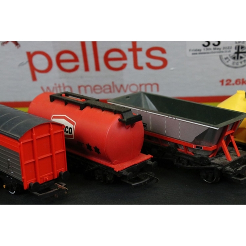 33 - 37 OO gauge items of rolling stock featuring tankers, wagons and vans to include Hornby, Wrenn, Bach... 