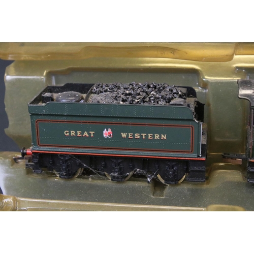 57 - Three Hornby OO gauge locomotives with tenders to include Boxed R125 4-4-0 Locomotive ' County of Co... 