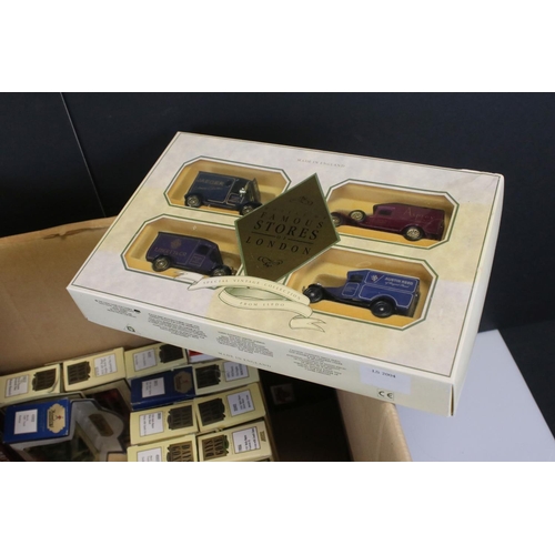 422 - 32 Boxed diecast models to include Lledo (Royal Wedding, US Army, The Home Front, etc), Corgi, Atlas... 