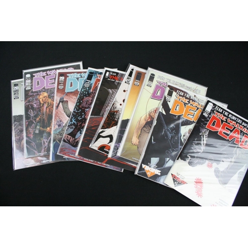 129 - Comics - Around 170 Image The Walking Dead comics, all bagged and boarded, various covers include is... 