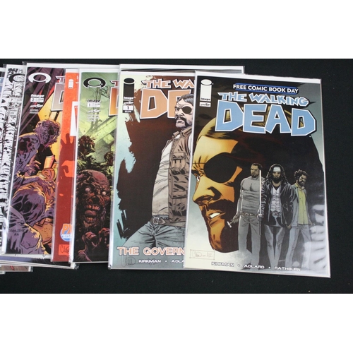 129 - Comics - Around 170 Image The Walking Dead comics, all bagged and boarded, various covers include is... 