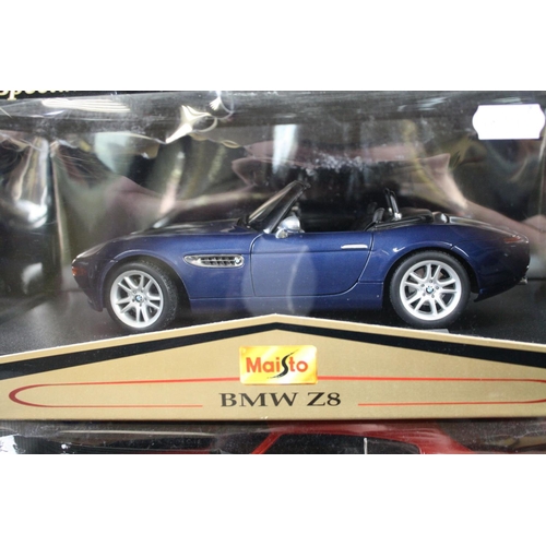 385 - Seven boxed 1:18 diecast models to include 4 x Maisto (BMW Z8, Dodge Concept Vehicle, Audi TT Roadst... 