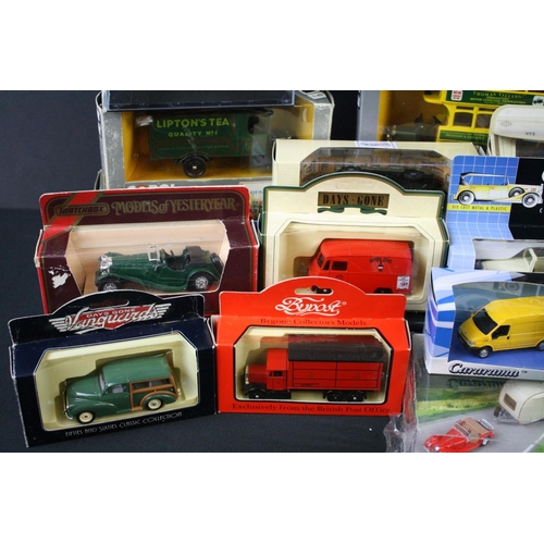 391 - Around 34 boxed diecast models, to include Corgi Classics. Ertl, Matchbox, Lledo etc, boxes and diec... 