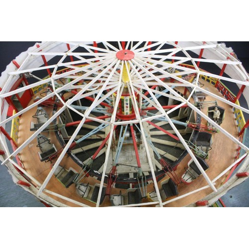 276 - Wooden scratch built model of a working carousel, untested, showing some age, titled 