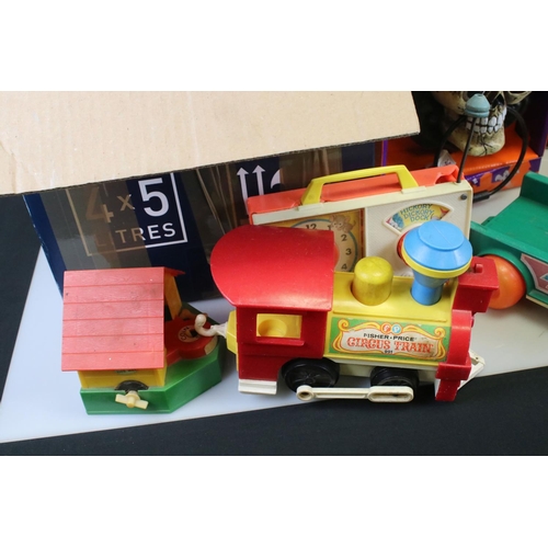 215 - Large collection of mixed toys to include Garfield alarm clock, tinplate train, Fisher Price, M & M ... 