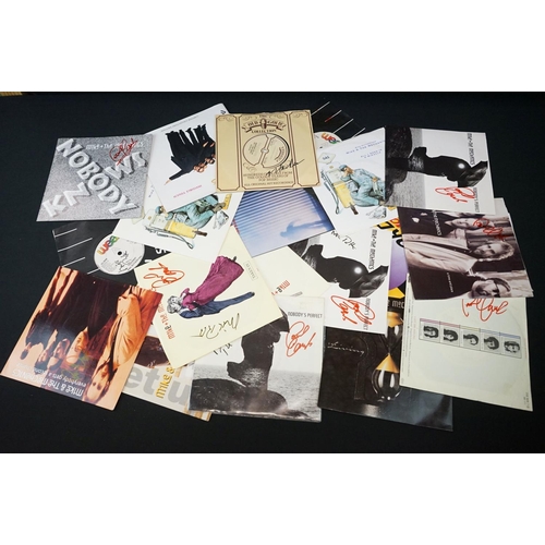 199 - Vinyl & Autographs - 37 Genesis & Members singles all signed by Mike Rutherford and many also signed... 