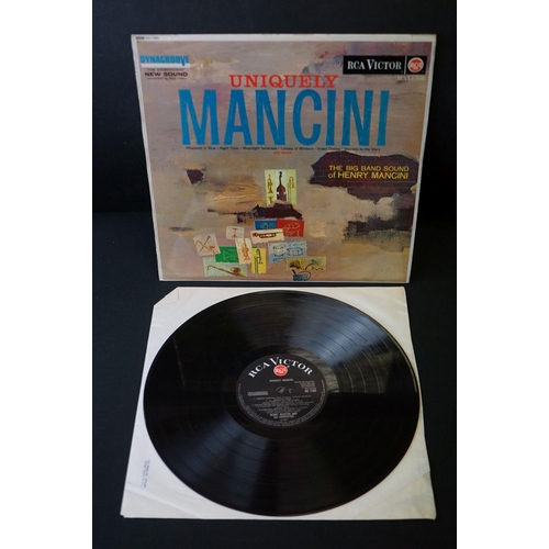 12 - Vinyl & Autograph - Henry Mancini - 2 LP’s one signed and dedicated on back by Henry Mancini.  Uniqu... 