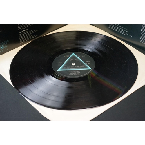 51 - Vinyl - Pink Floyd two copies of Dark Side Of The Moon (SHVL 804).  Both have stickered sleeves, one... 