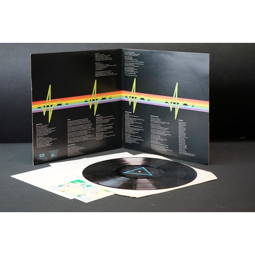 51 - Vinyl - Pink Floyd two copies of Dark Side Of The Moon (SHVL 804).  Both have stickered sleeves, one... 