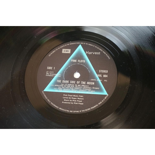 51 - Vinyl - Pink Floyd two copies of Dark Side Of The Moon (SHVL 804).  Both have stickered sleeves, one... 