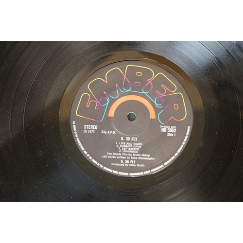 402 - Vinyl - 9.30 Fly self titled on Ember Records NR 5062.  Textured sleeve has sticker removal loss to ... 