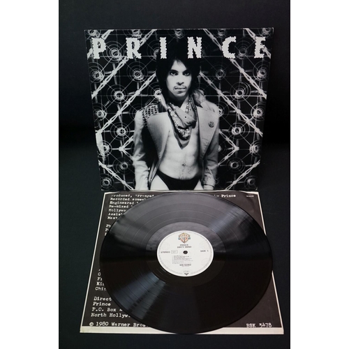 484 - Vinyl / Cassettes / Book - Prince 2 LP's to include Dirty Mind (WB56862) and Controversy (K 56950), ... 